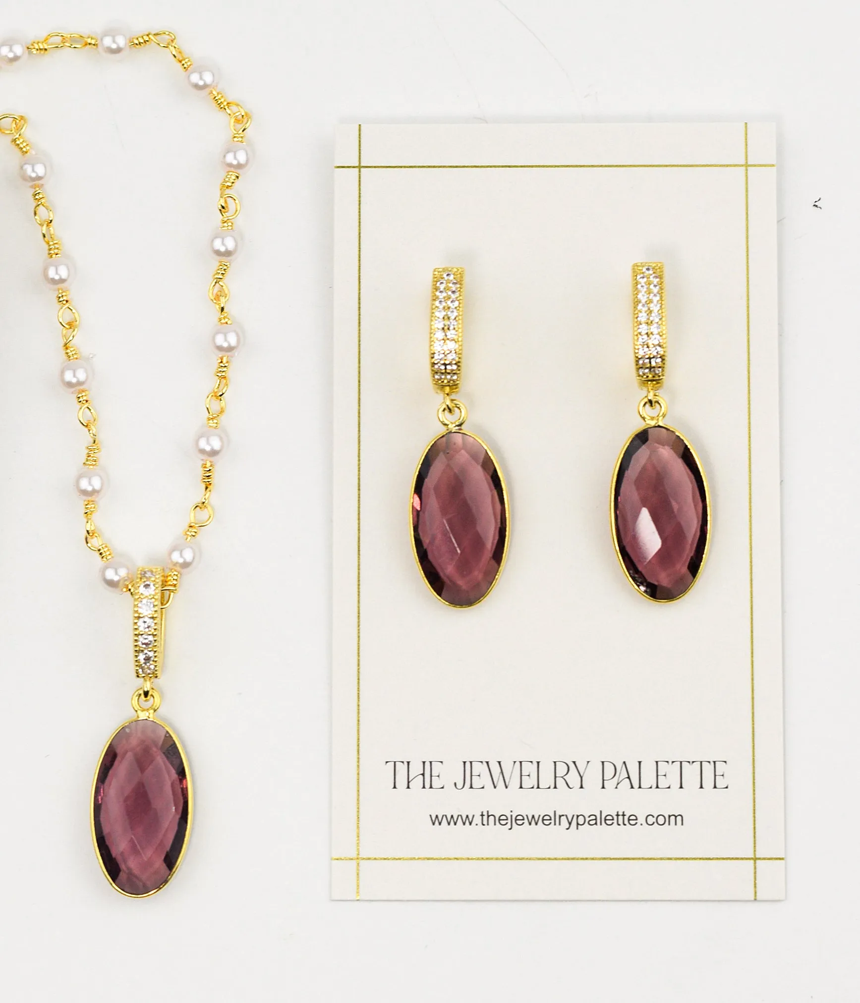 Penelope purple gemstone earrings and necklace