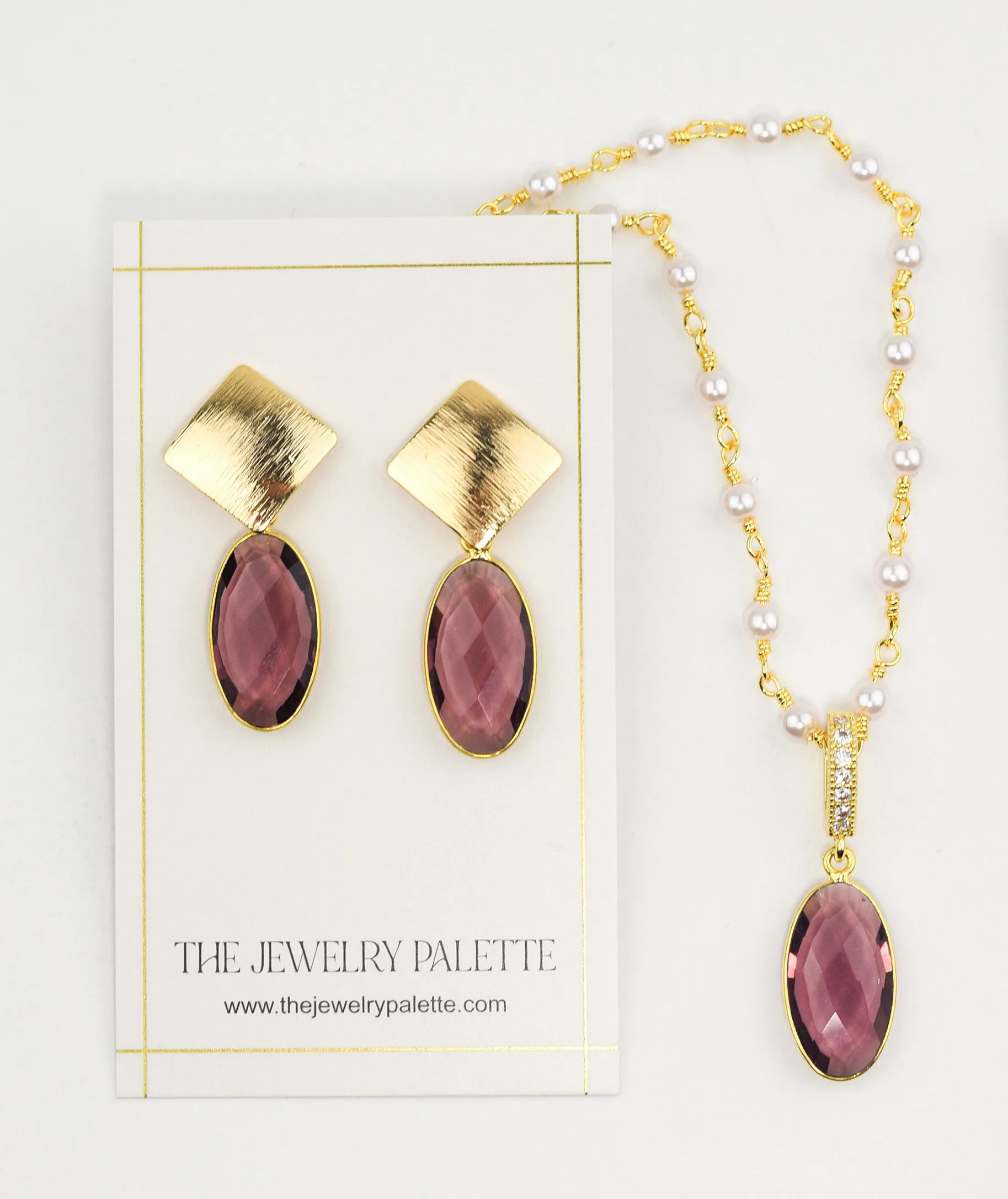 Penelope purple gemstone earrings and necklace